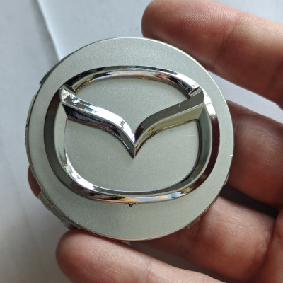 Ковпачки (заглушки) в диски Mazda, сірі 56\52мм BS1A-3719X